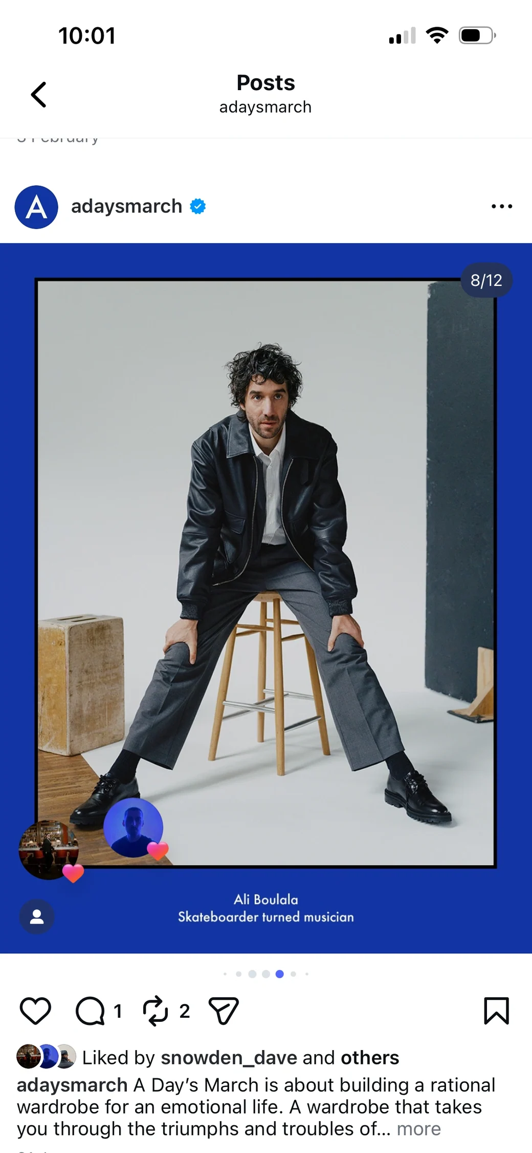 Blue-framed A Days March Instagram portrait of a seated model in a black leather jacket.