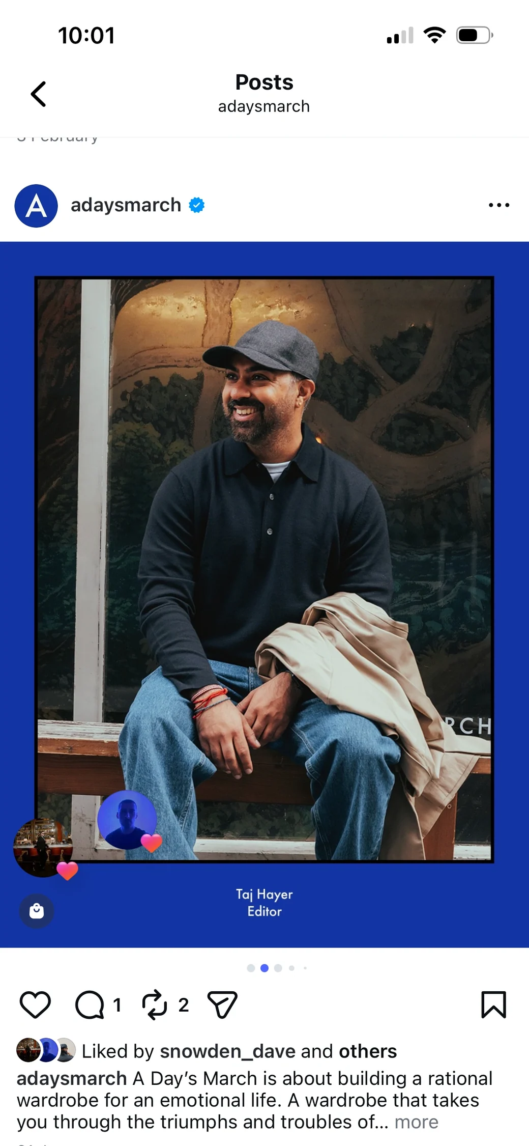 Blue-framed A Days March Instagram portrait of a seated man in sunglasses and a dark jumper.