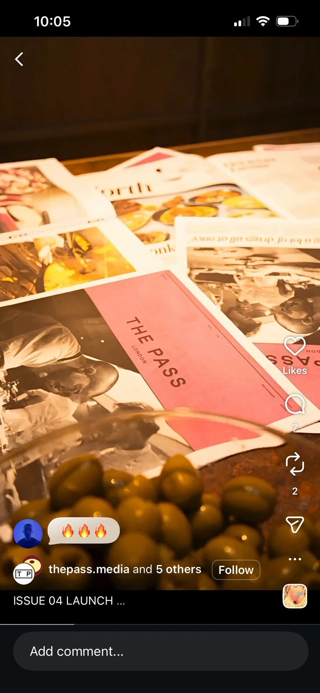 Instagram Reel showing The Pass magazine spreads and olives on a launch event table.