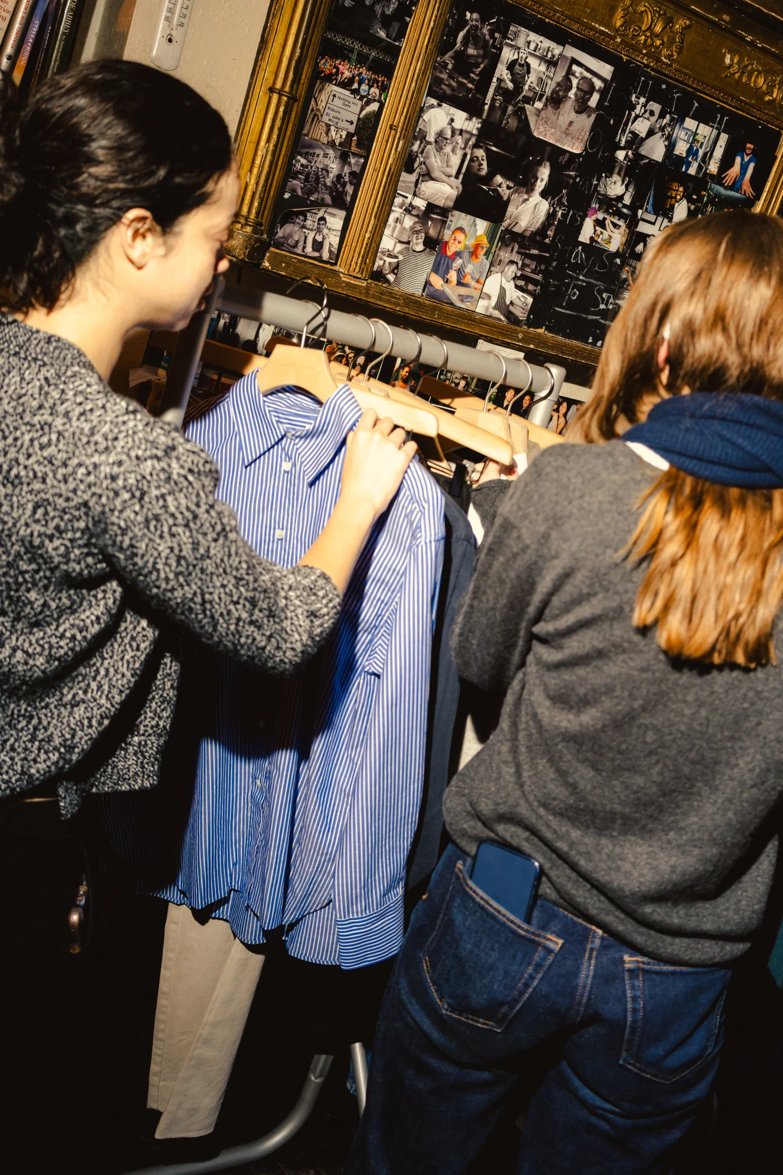 Guests browsing clothing displayed inside The Westbourne