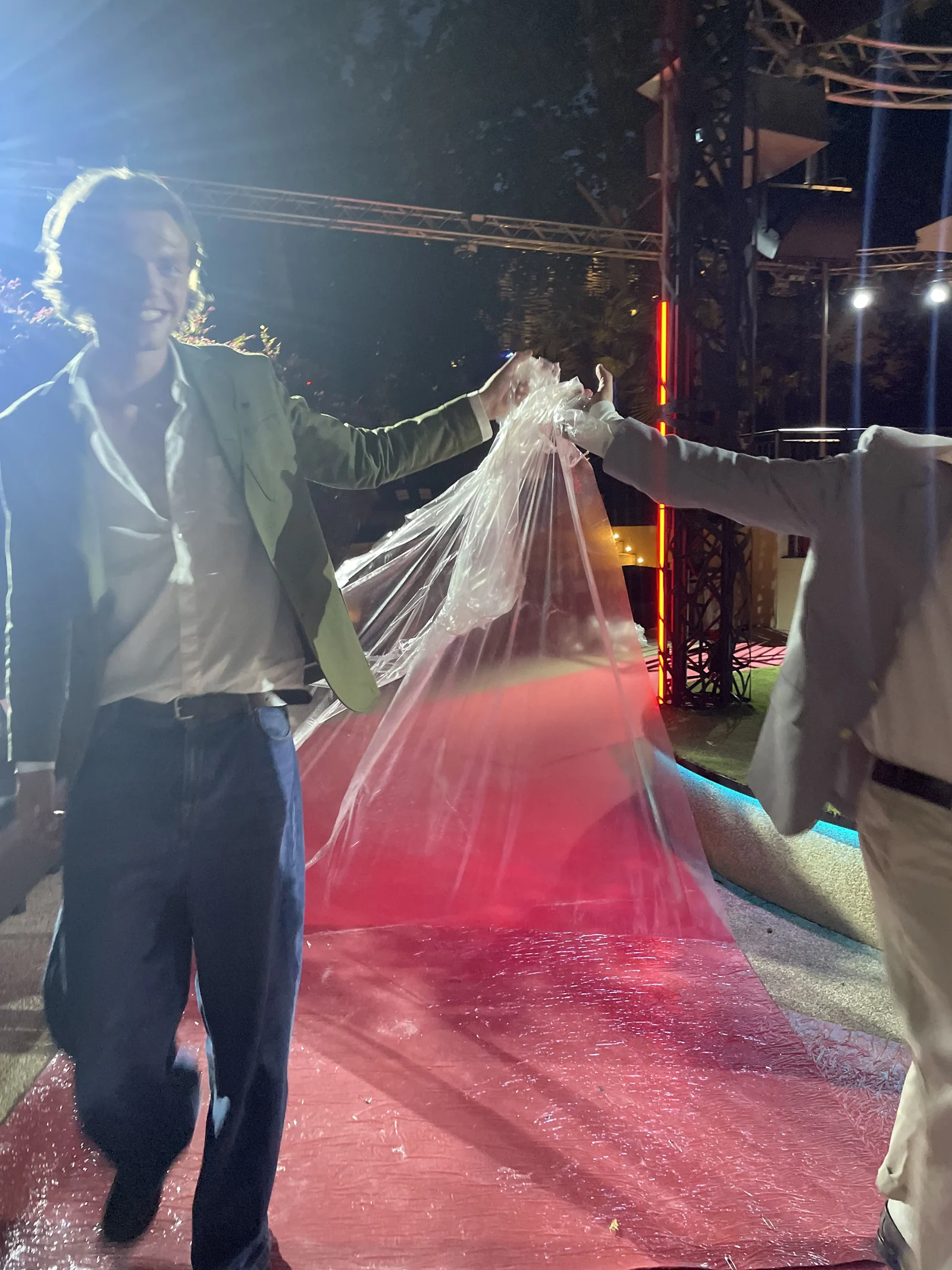 Backstage preparation with a long dress beside the red carpet