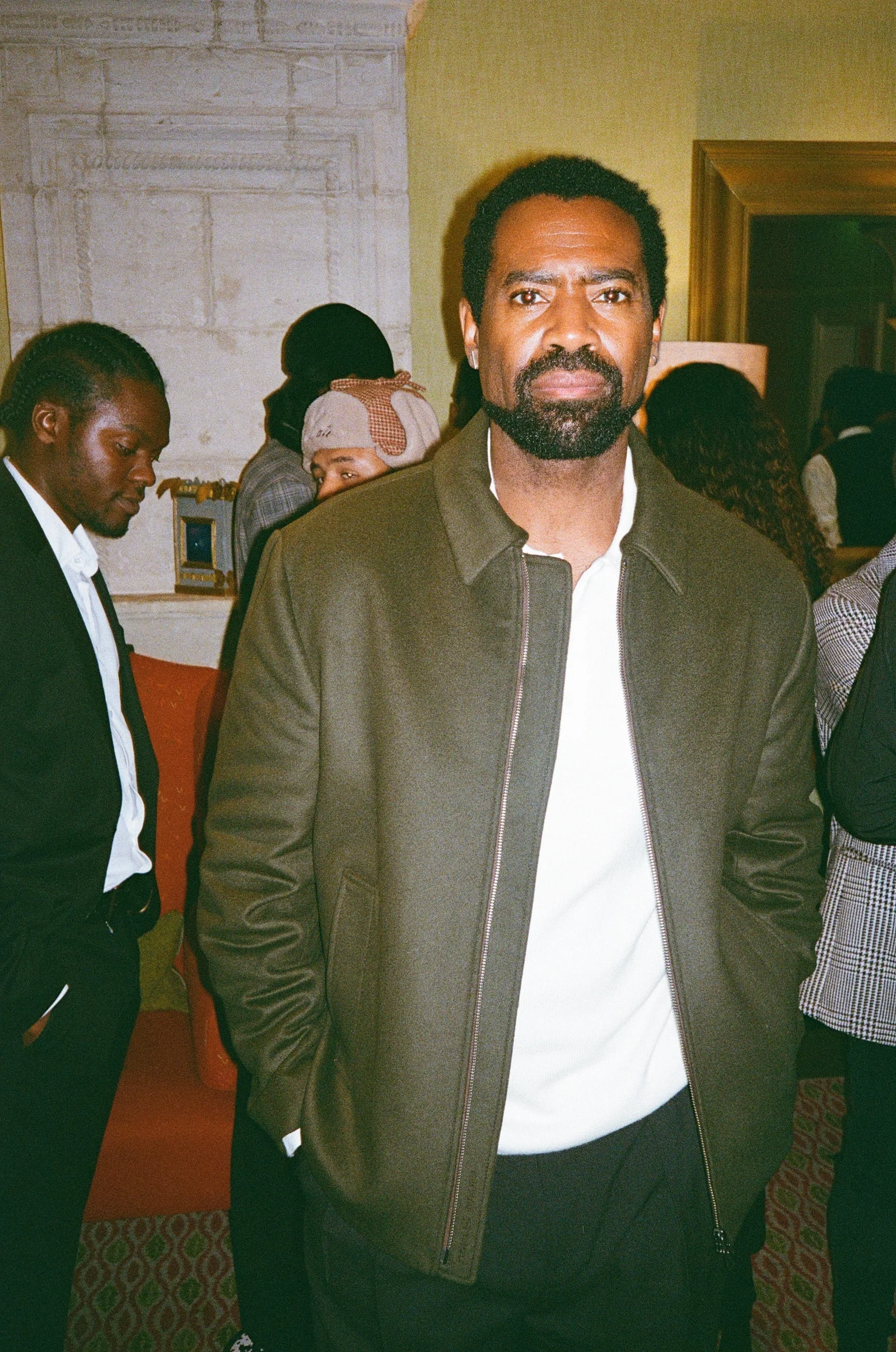 Guest wearing a brown jacket at the festival reception